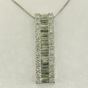 #18219 - Ladies round & baguette diamond pendant